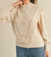 Ivory Cable Knit Pom Pom Mock Neck Sweater