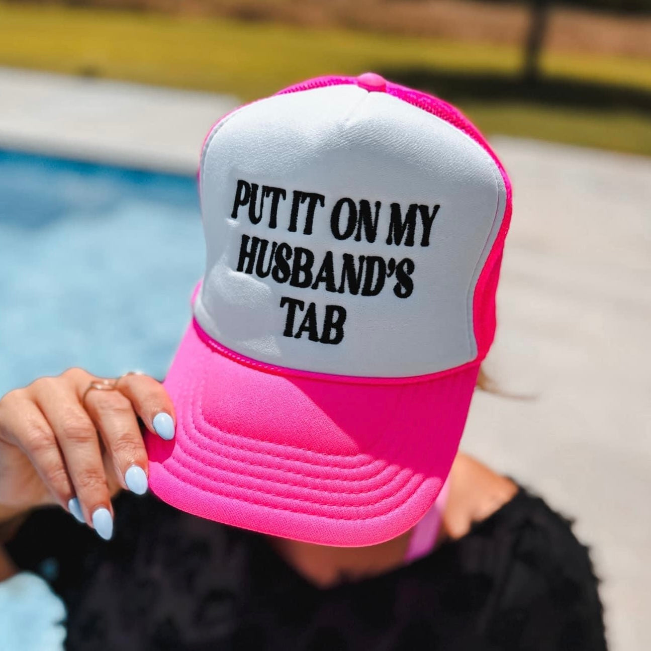 Put It On My Husbands Tab Trucker Hat